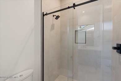 **JUST COMPLETED!** Experience luxury golf course living in the - photo 29