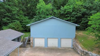 Tucked away on 13.62+/- surveyed acres in the rolling Ozark - photo 3
