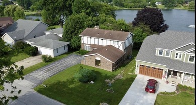 Opportunity awaits with this spacious two-story lakefront home - photo 33