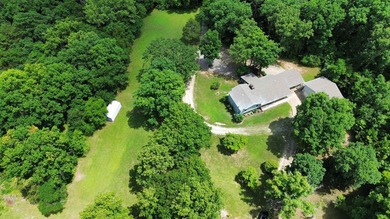 Tucked away on 13.62+/- surveyed acres in the rolling Ozark - photo 5