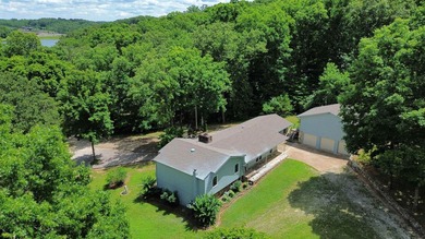 Tucked away on 13.62+/- surveyed acres in the rolling Ozark - photo 6