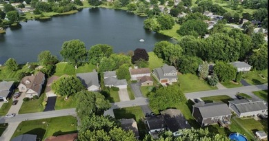 Opportunity awaits with this spacious two-story lakefront home - photo 37