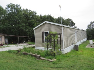 Truman Lake Home For Sale in Deepwater Missouri