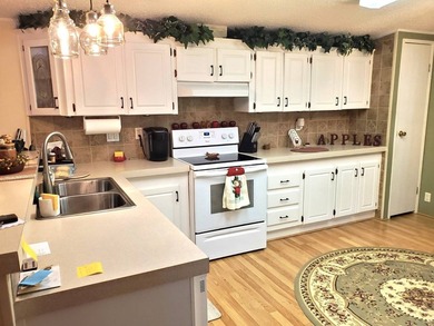 THIS HOME IS ON LEASED LAND WITH A MONTHLY LOT RENT OF $644 AND - photo 22