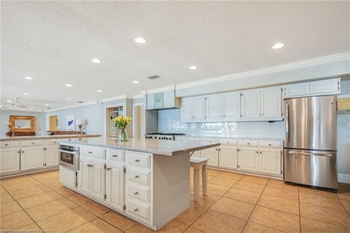 Welcome to a rare opportunity on the shores of Lake Huntley - photo 8