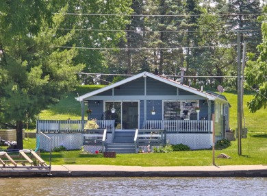 A lake life awaits! This low maintenance cottage on the north - Lake Home For Sale in Monticello, Indiana