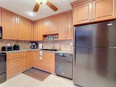 Step inside to discover an updated kitchen with modern finishes - photo 11