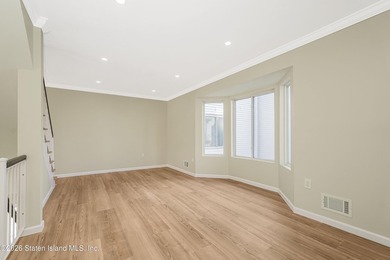 Built in 2004, fully renovated in 2026 this huge end unit - photo 12