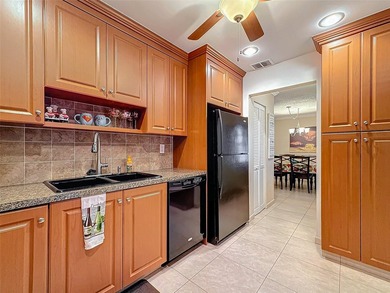 Step inside to discover an updated kitchen with modern finishes - photo 14