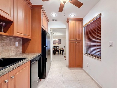 Step inside to discover an updated kitchen with modern finishes - photo 15