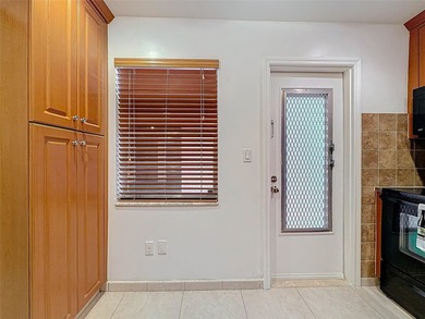 Step inside to discover an updated kitchen with modern finishes - photo 16