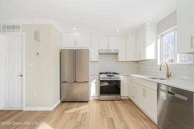 Built in 2004, fully renovated in 2026 this huge end unit - photo 16