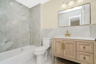 Built in 2004, fully renovated in 2026 this huge end unit - photo 19