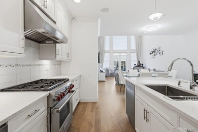 A Fabulous Jamestown Townhouse has a dramatic 2 Story Grand - photo 9