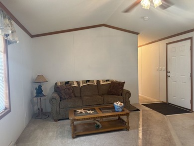 Welcome to this charming 3-bedroom, 2-bath home located in the - photo 2