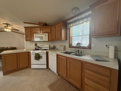 Welcome to this charming 3-bedroom, 2-bath home located in the - photo 6