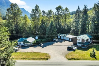 Legal Triplex w/ separate hydro meters plus a Rancher (SFD) on - photo 3