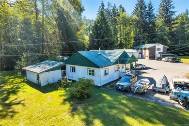 Legal Triplex w/ separate hydro meters plus a Rancher (SFD) on - photo 4