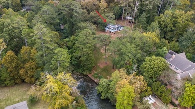 This rare waterfront property offers endless potential in one of - photo 4