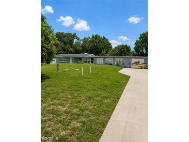 Location! Location! Location! This home is on HALF-ACRE lot & - photo 1