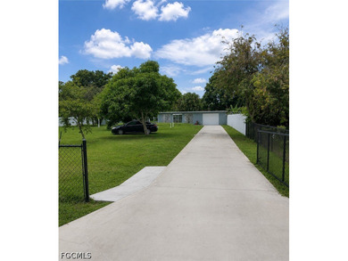 Location! Location! Location! This home is on HALF-ACRE lot & - photo 2