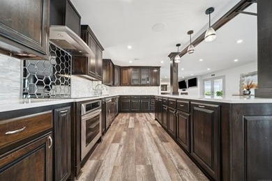 MOTIVATED SELLER! This extraordinary Lake Hudson estate blends - photo 8