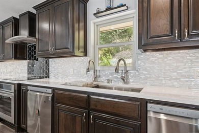 MOTIVATED SELLER! This extraordinary Lake Hudson estate blends - photo 9