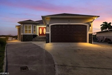 This beautiful 3 Bed 3 & 1/2 Bath riverfront pool home is truly - photo 2