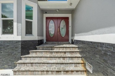 This beautiful 3 Bed 3 & 1/2 Bath riverfront pool home is truly - photo 3