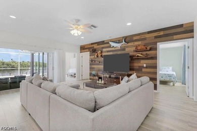This beautiful 3 Bed 3 & 1/2 Bath riverfront pool home is truly - photo 4