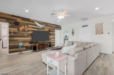 This beautiful 3 Bed 3 & 1/2 Bath riverfront pool home is truly - photo 5