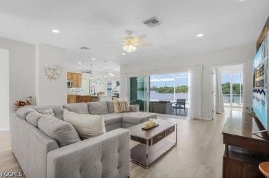 This beautiful 3 Bed 3 & 1/2 Bath riverfront pool home is truly - photo 7