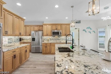 This beautiful 3 Bed 3 & 1/2 Bath riverfront pool home is truly - photo 8