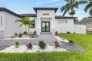 Welcome to this stunning luxury residence located in the highly - photo 2