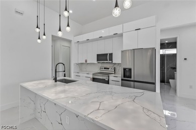 Welcome to this stunning luxury residence located in the highly - photo 8