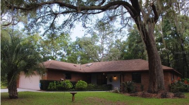 Beautifully maintained brick 3 bedroom 2.5 bath home in quiet - Lake Home Sale Pending in Melrose, Florida