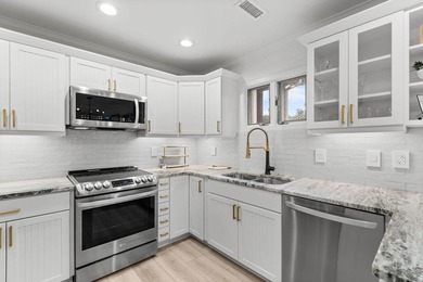 Beautifully Updated End Condo with Golf Course Views!Nestled in