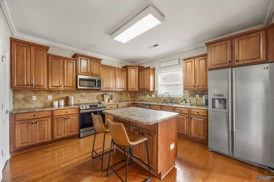 Located in the beautifully landscaped Canebrake Golf Community - photo 8