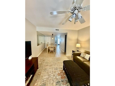 This rarely available Stones Throw villa is tucked beneath a - photo 9