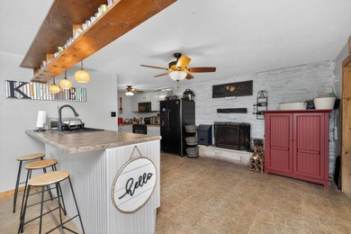 This four-bedroom, three-bath, 2,994-square-foot split level - photo 6