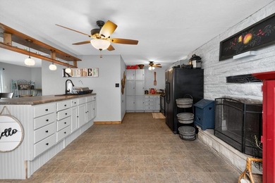 This four-bedroom, three-bath, 2,994-square-foot split level - photo 7