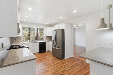 Experience this beautifully updated farmhouse-style home - photo 15