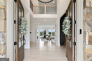 With 6,872 square feet, 6 bedrooms, and 6.5 bathrooms, every - photo 3