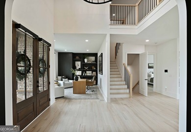 With 6,872 square feet, 6 bedrooms, and 6.5 bathrooms, every - photo 8