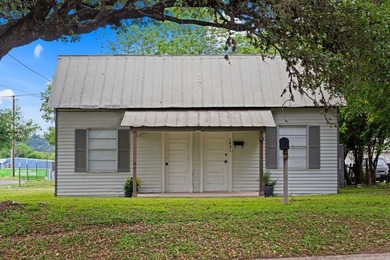 Charming cottage-style home on an oversized corner lot with - photo 2