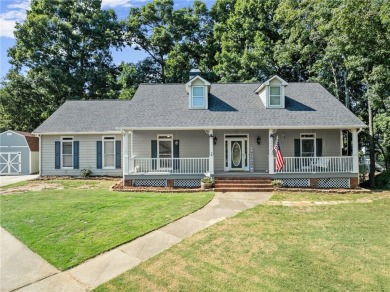 Lake Home For Sale in Flowery Branch, Georgia