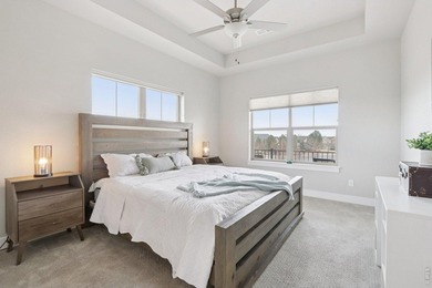 Enjoy low-maintenance living in this third-floor end-unit condo