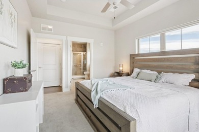 Enjoy low-maintenance living in this third-floor end-unit condo