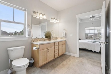 Enjoy low-maintenance living in this third-floor end-unit condo