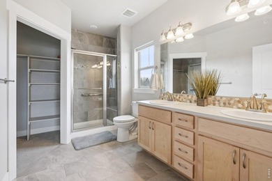 Enjoy low-maintenance living in this third-floor end-unit condo